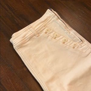 Creme pants with button pockets